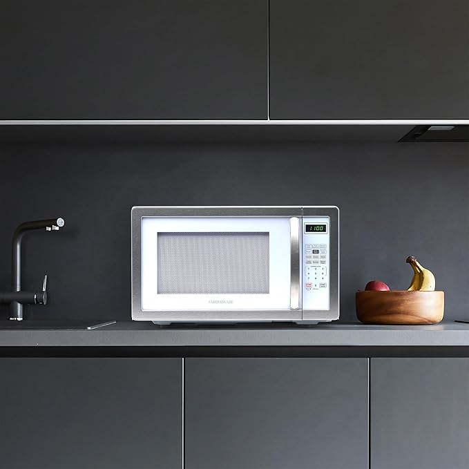 Farberware 1.1 Cu. Ft. Countertop Microwave Oven – 1000 Watts Power, Auto Cook Settings, Defrost, Easy Clean and Child Safety Lock - White Platinum