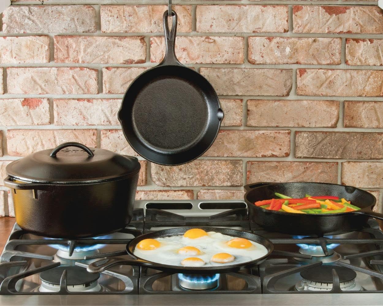 Lodge 12 Inch Cast Iron Skillet with Red Silicone Hot Handle Holder – Pre-Seasoned Frying Pan for Stove, Oven, Grill & Campfire – Made in the USA – Durable, Nonstick Cast Iron Cookware – Black
