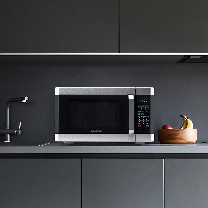 Farberware 1.6 Cu. Ft. Countertop Microwave Oven – 1100 Watts Power, Smart Sensor Auto Cook Settings, Defrost, Easy Clean and Child Safety Lock - Stainless