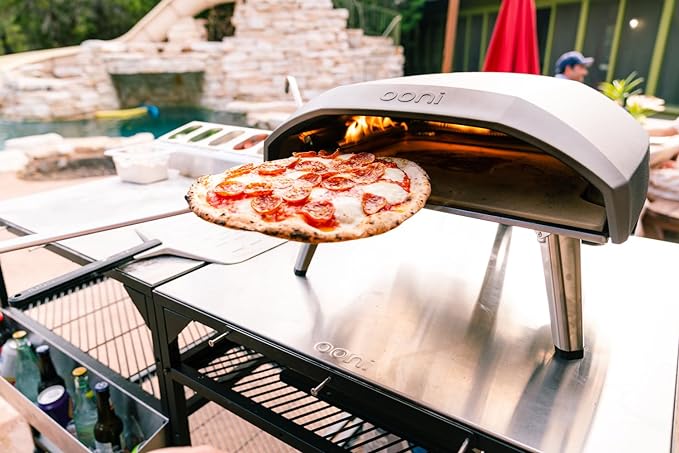 ooni Pizza Turning Peel - 7 Inch Aluminum Perforated Pizza Peel, Lightweight Metal Pizza Turner with Long Handle, Pizza Tools, Pizza Oven Accessories