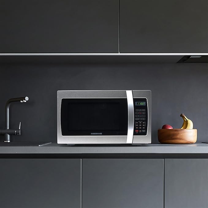 Farberware 1.3 Cu. Ft. Countertop Microwave Oven – 1000 Watts Power, Auto Cook Settings, Defrost, Easy Clean and Child Safety Lock - Stainless