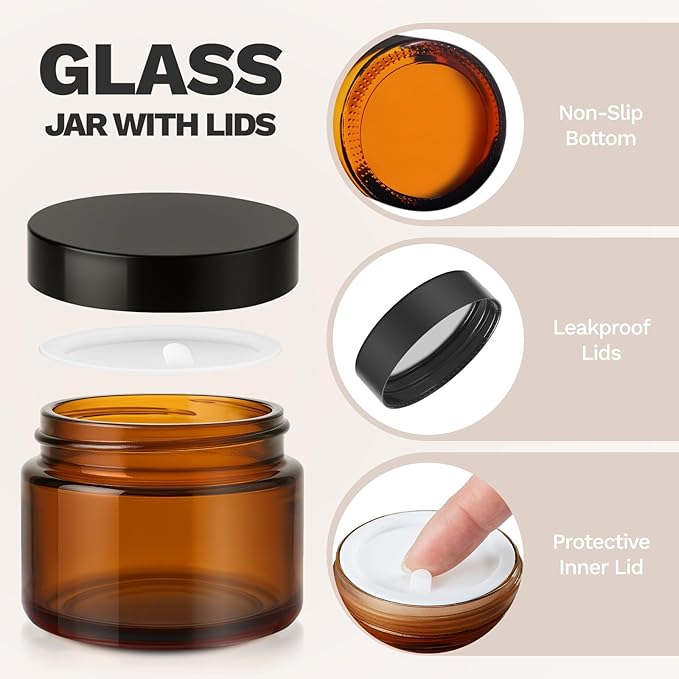 Bumobum 1 oz Amber Glass Jars with Lids, 105 pack Clear Small Jars with Black Lids, White Labels and Inner Liners, Empty Round Cosmetic Containers for Cream, Lotion (Amber 105 Pack)