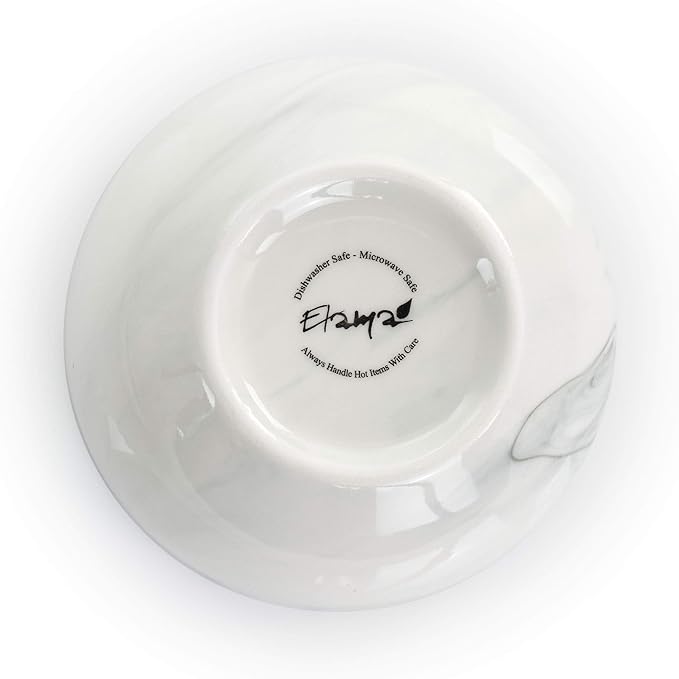 Elama Fine Marble 16 Piece Stoneware Dinnerware Set in Black and White