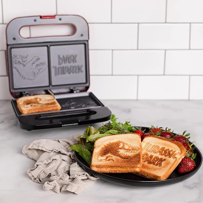 Uncanny Brands Jurassic Park Grilled Cheese Maker- Panini Press and Compact Indoor Grill- Opens 180 Degrees for Burgers
