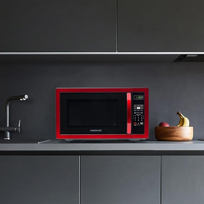 Farberware 1.1 Cu. Ft. Countertop Microwave Oven – 1000 Watts Power, Auto Cook Settings, Defrost, Easy Clean and Child Safety Lock - Metallic Red