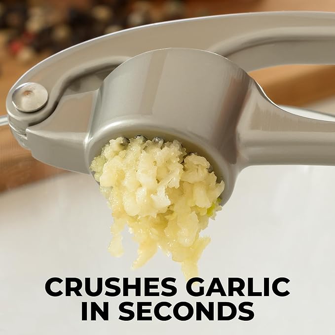 Zulay Kitchen Premium Garlic Press - Durable Garlic Masher with Soft, Easy to Squeeze Handle - Garlic Mincer Tool - Sturdy Easy to Clean Garlic Crusher (Silver)