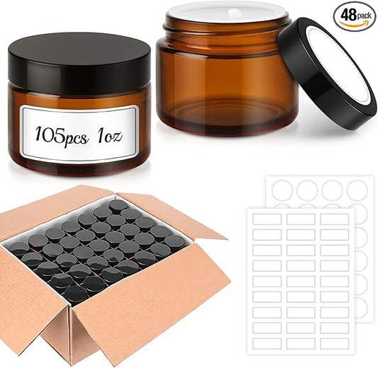 Bumobum 1 oz Amber Glass Jars with Lids, 105 pack Clear Small Jars with Black Lids, White Labels and Inner Liners, Empty Round Cosmetic Containers for Cream, Lotion (Amber 105 Pack)