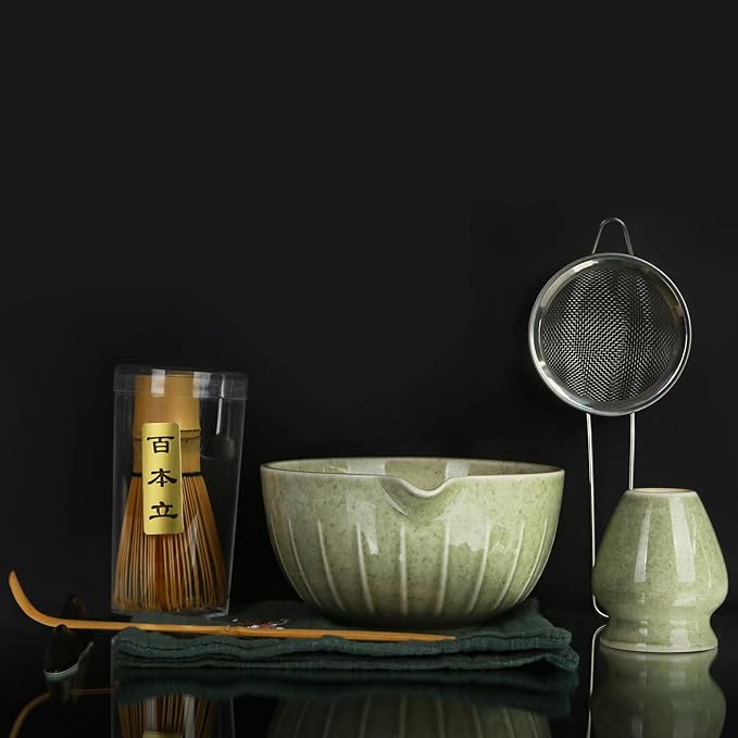 Matcha Bowl and Tea Whisk Set, 7-Piece Collection: 19-ounce ceramic bowl, whisk stand, bamboo scoop with scoop holder, tea strainer, and tea towel. Complete matcha ceremony set.