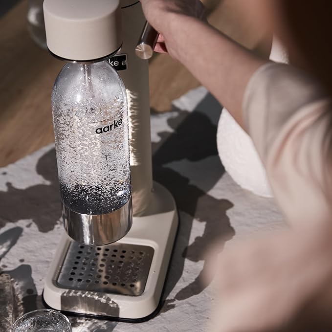 Aarke Carbonator lll with CO2 Cylinder, Sparkling & Carbonation Water Machine, Stainless Steel with PET BPA-Free Reusable Bottle Volume 1L/34 fl oz (Sand)