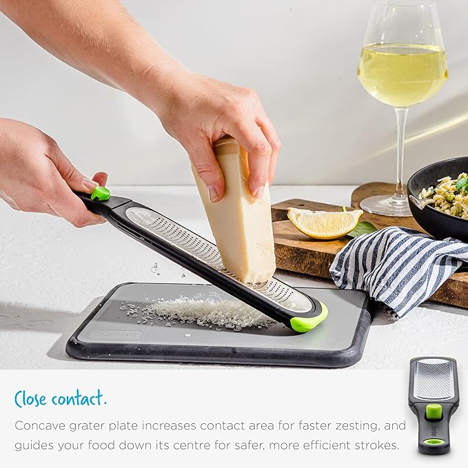 Dreamfarm Ozest Self-Cleaning POP-Button Zester for Fine, Fluffy Citrus Zest, Cheese, Nut, & Spices with Non-Slip Silicone Foot - 1mm Zester, Black/Green