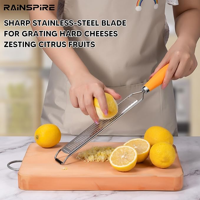 Rainspire Zester Grater with Handle, Lemon Zester Cheese Grater for Kitchen Stainless Steel, Parmesan Cheese Garlic Nutmeg Chocolate Fruits Vegetables Ginger Grater, Fine (Orange)