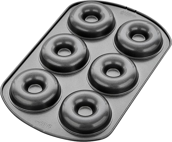 Wilton 6-Cavity Doughnut Baking Pan, Makes Individual Full-Sized 3 3/4" Donuts or Baked Treats, Non-Stick and Dishwasher Safe, Enjoy or Give as Gift, Metal (1 Pan)