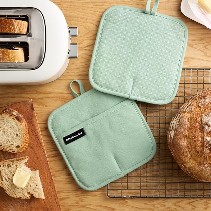 KITCHENAID Gourmet Series Gridlines Pot Holders 2-Pack Set, Heat Resistant up to 600°F, Soft Silicone Grip, Magnetic Cuff, Pistachio Green, 8"x8"